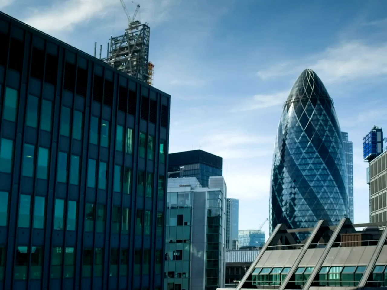 An illustrative view of a commercial district, introducing a film about business opportunities