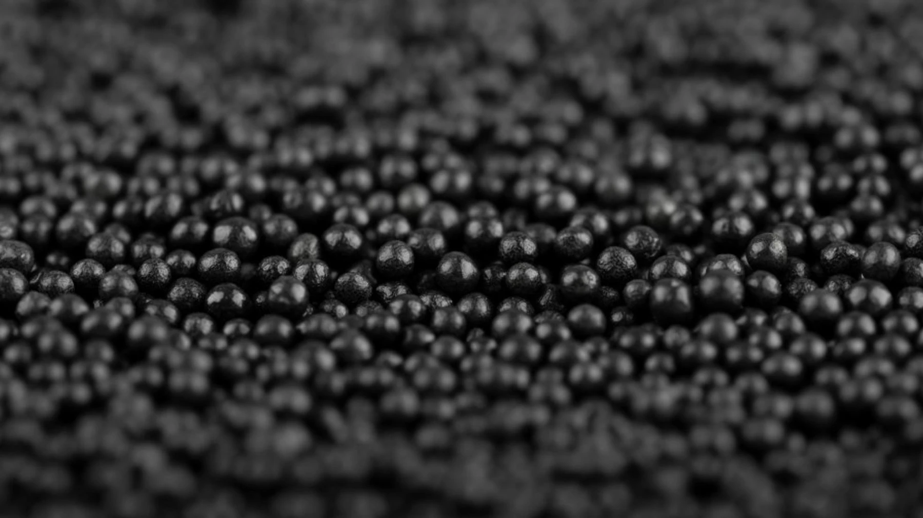 A close view of dark catalyst granules.