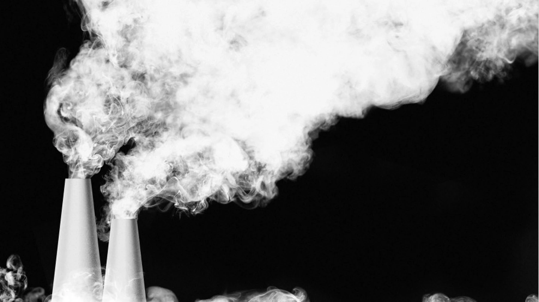 Industrial stacks and a visible plume against a dark background.